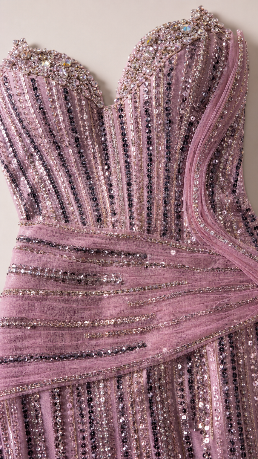 Close-up detail of embellished sweetheart bodice with sequins and draped tulle