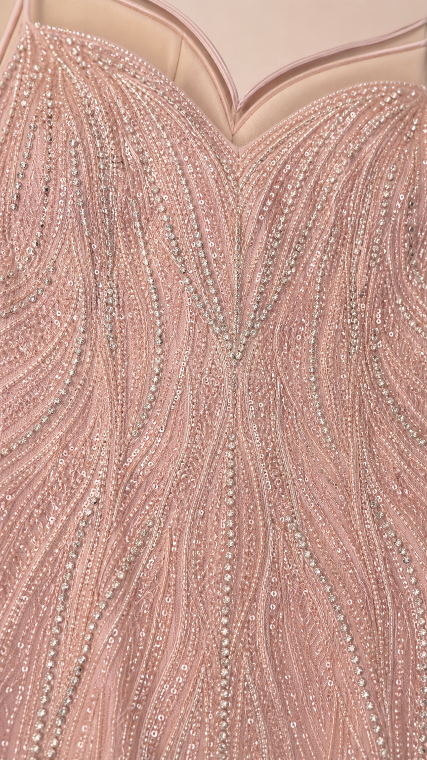 Close-up of beaded and sequined fabric detail