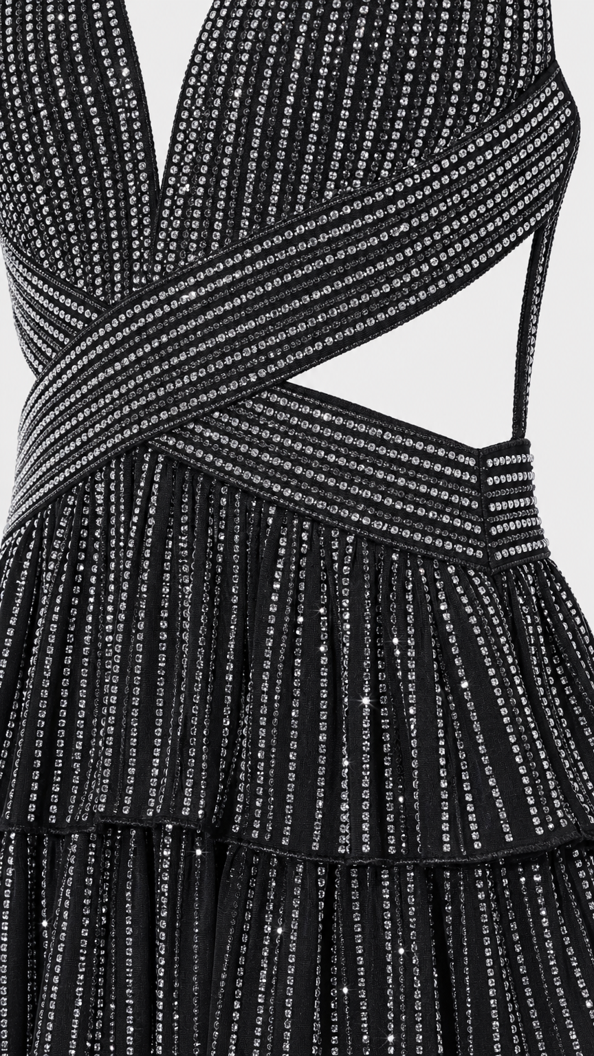 Close-up detail of black glitter crisscross bodice and fabric texture