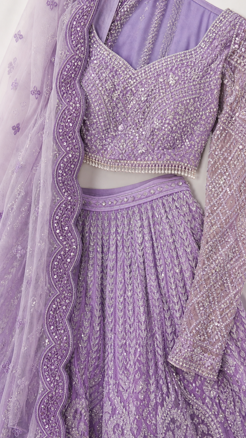 Close-up detail of lavender sequin and thread embroidery on choli and skirt waistband