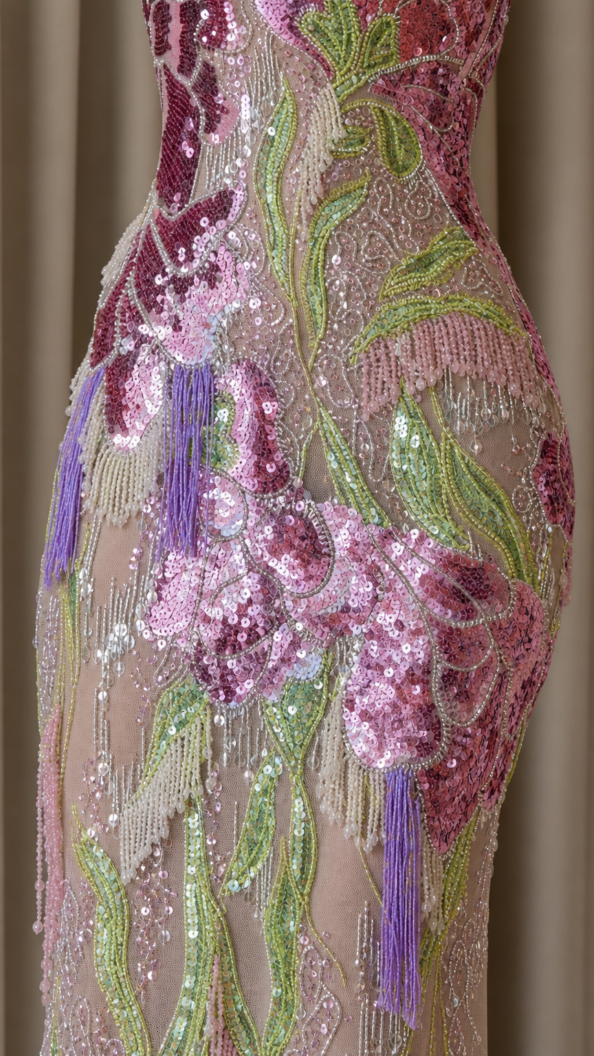 Close-up detail of sequin and bead embroidery on gown