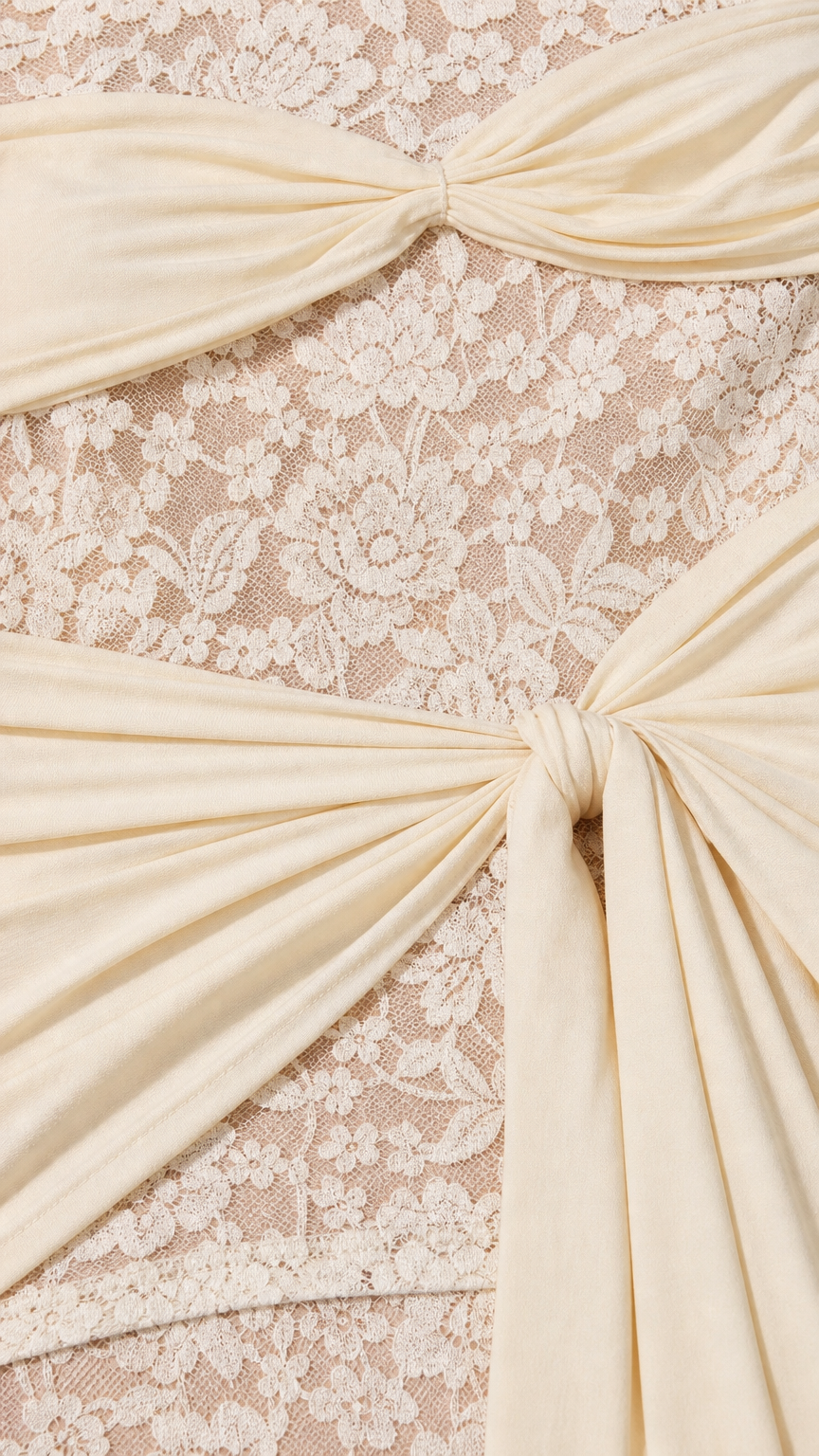 Close-up detail of lace texture and knot drape