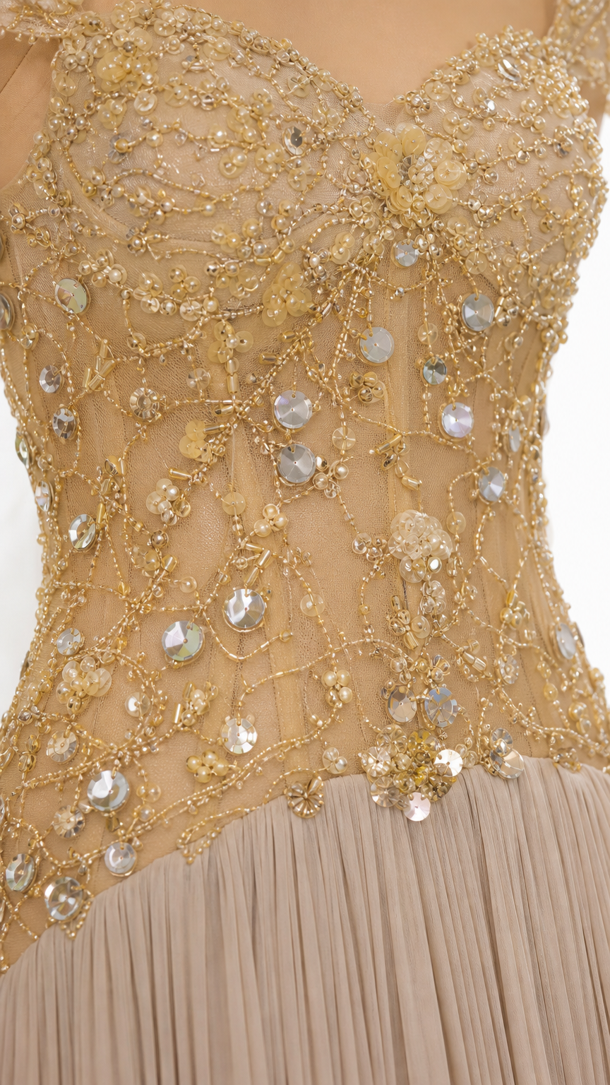 Close-up detail of the intricate sequin, crystal, and beaded floral embroidery on the bodice