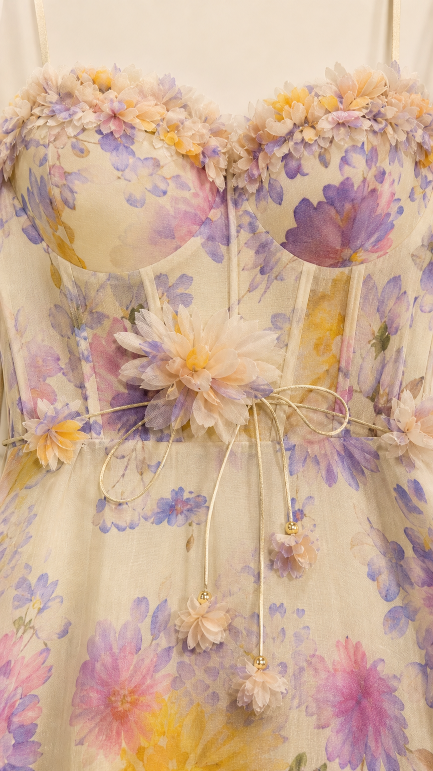 Close-up detail of sweetheart corset bodice with 3D floral appliques