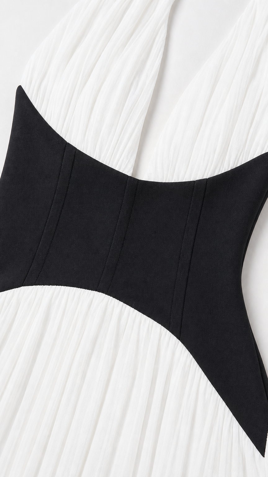 Close-up detail of contrast corset waist on dress