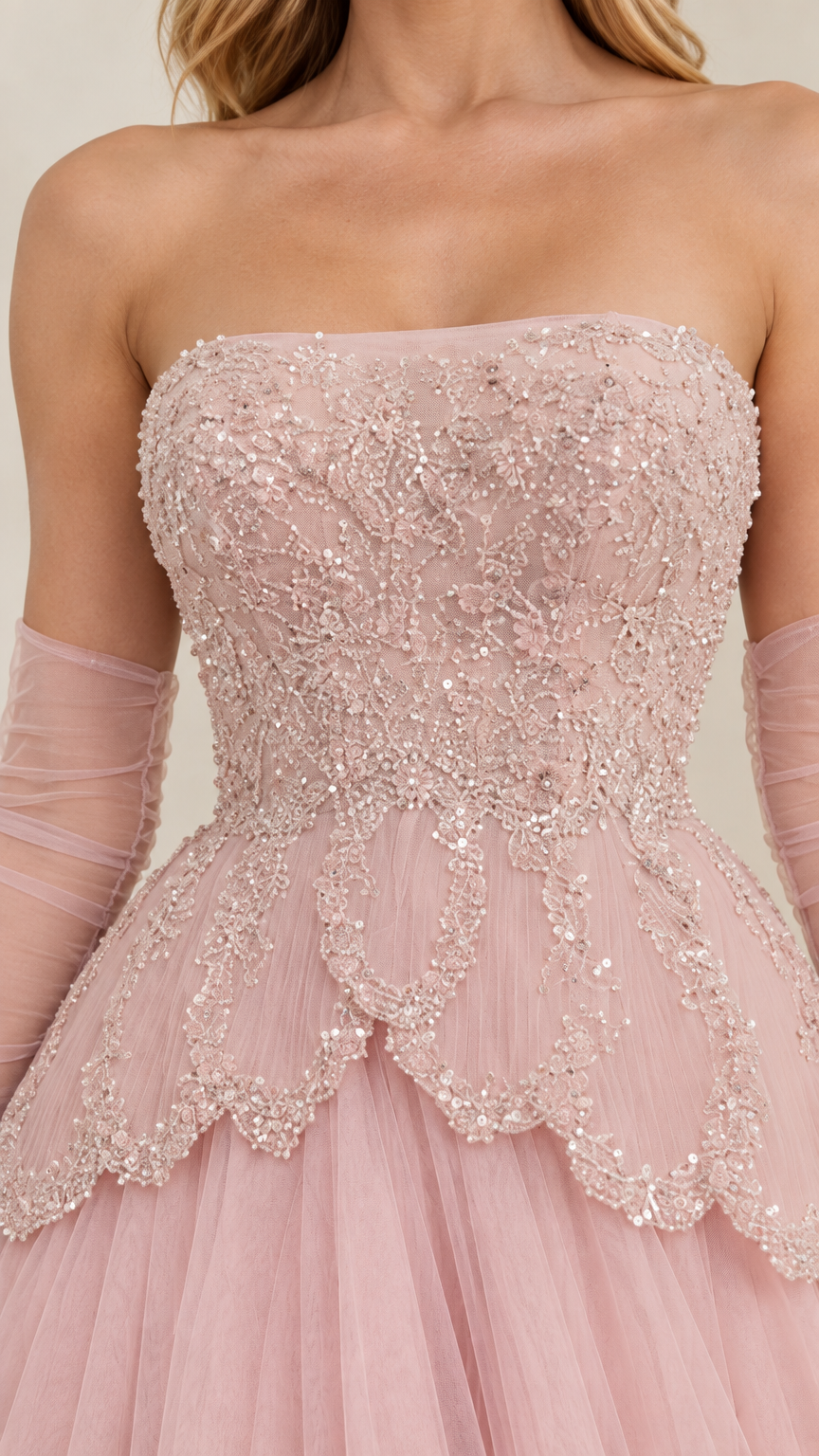 Close-up detail of Blush Pink beaded and embroidered bodice with scalloped waistline