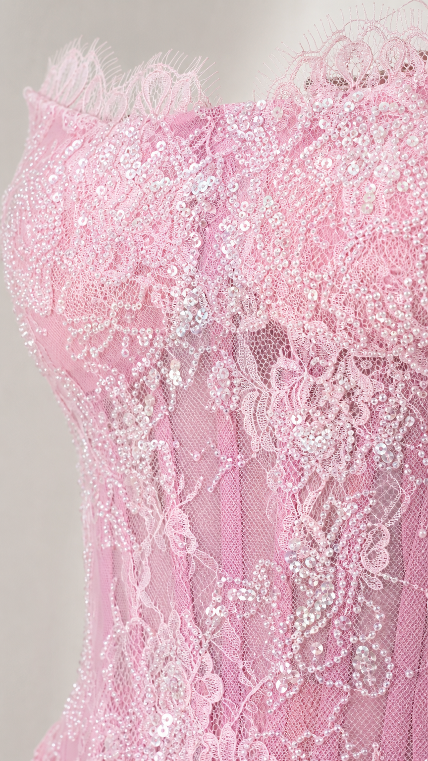 Close-up detail of lace texture and sequins on the bodice