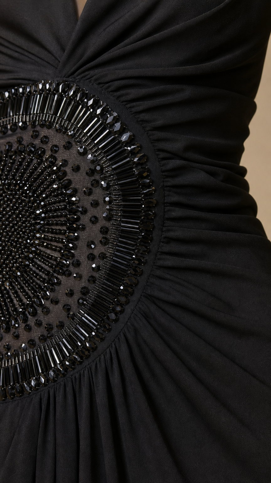 Close-up of intricate beaded waist medallion detail
