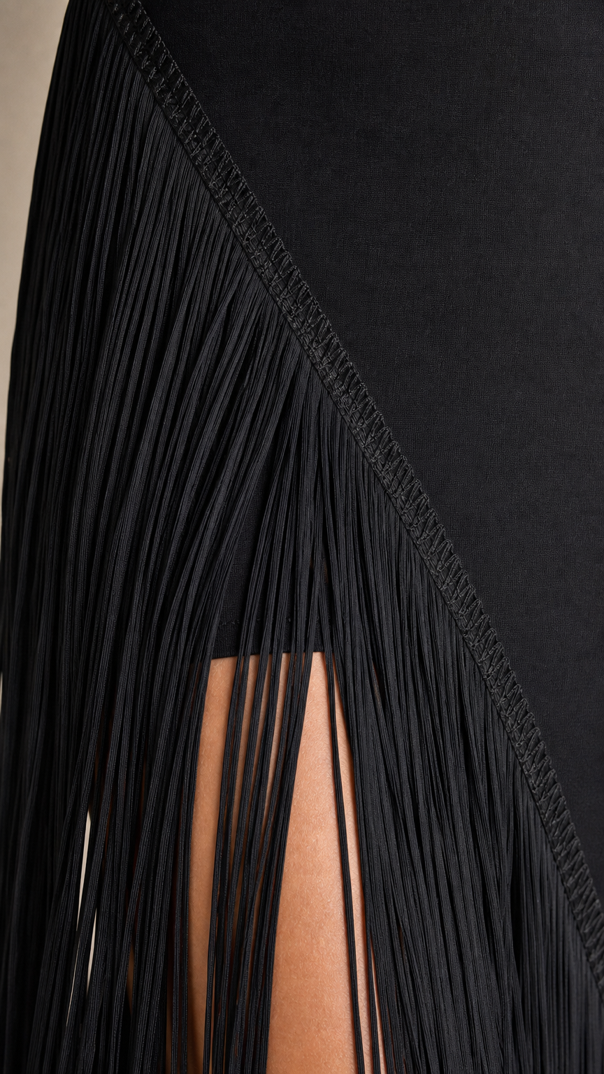 Close-up of black fringe overlay and side slit detail