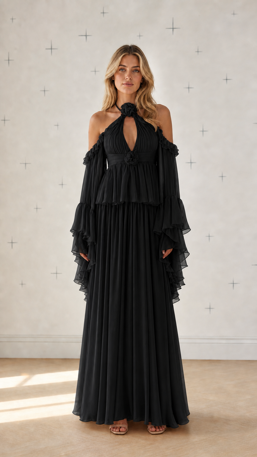 Front view of black cold-shoulder pleated maxi dress