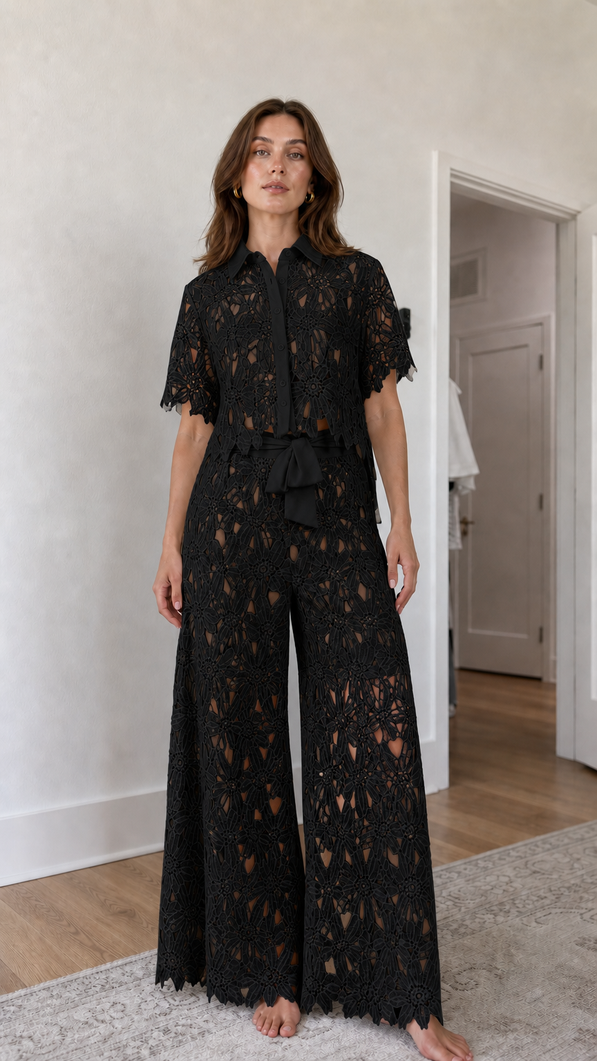 Woman wearing black floral lace shirt and wide-leg pants set