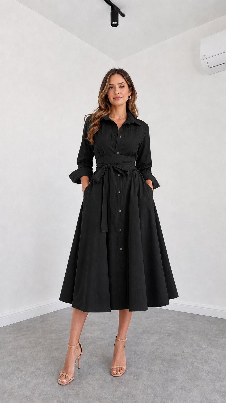 Front view of model wearing Black button-down belted midi shirt dress