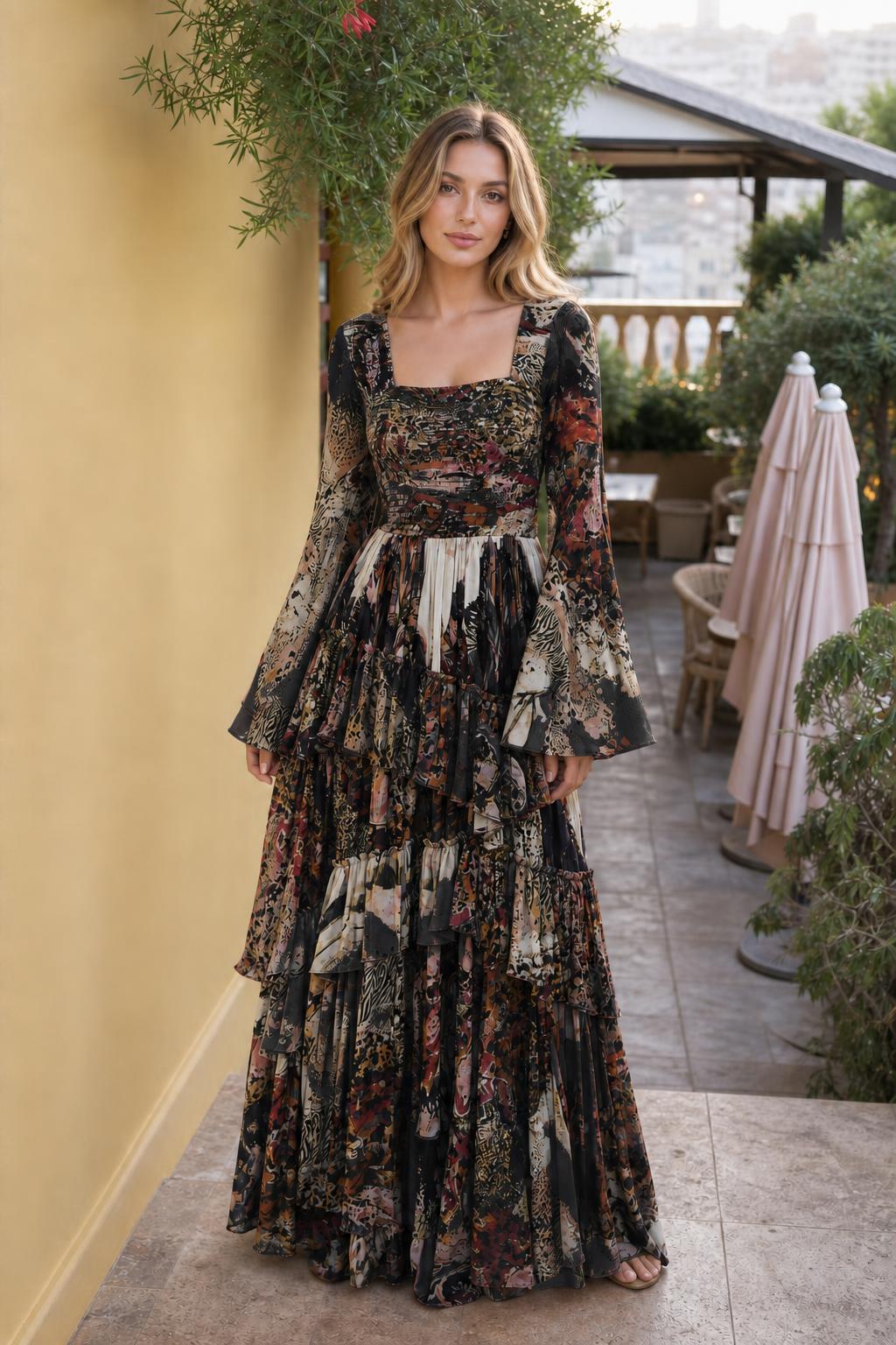 Model wearing black variant of the tiered maxi dress