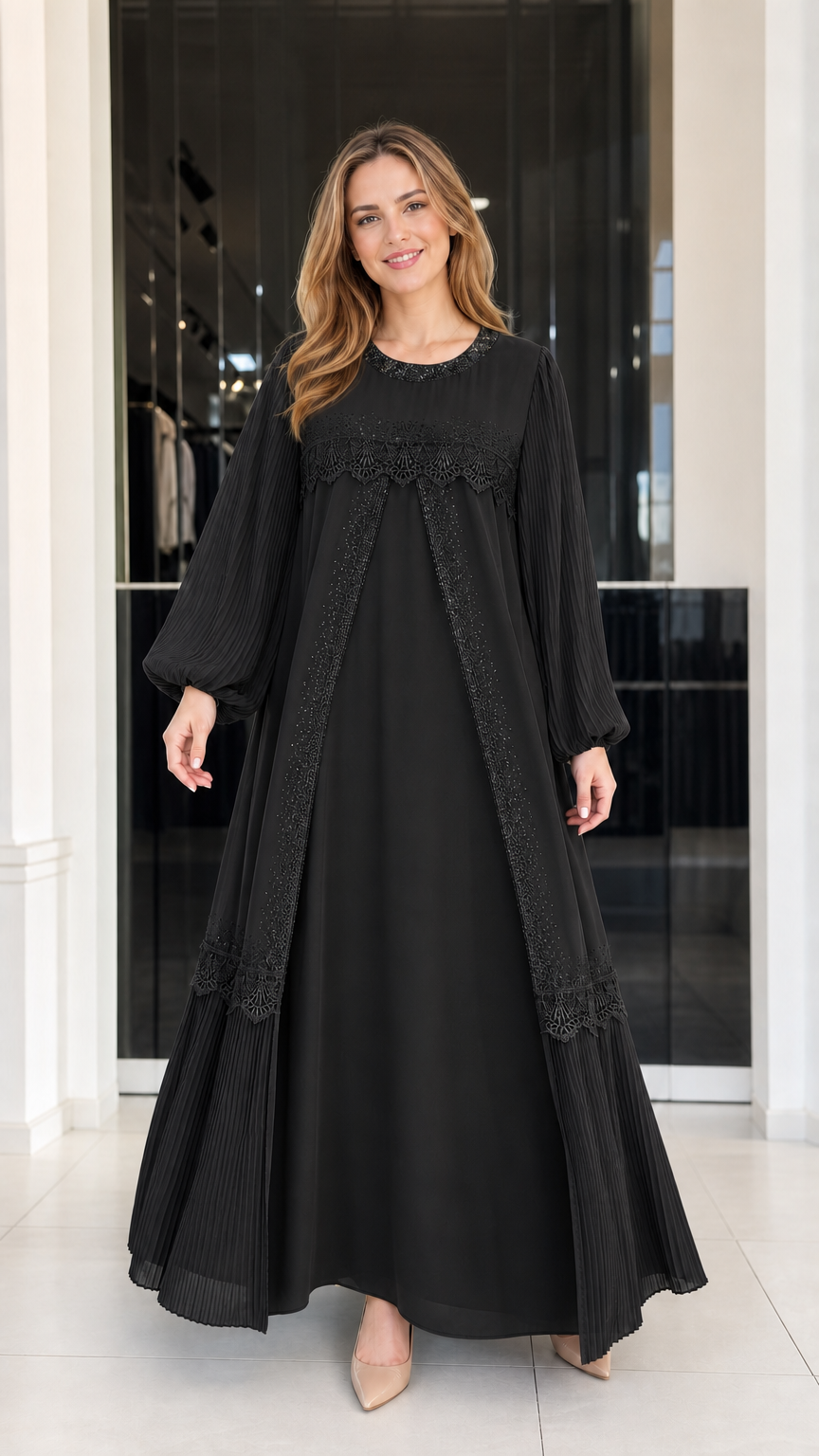 Front view of woman wearing black pleated balloon sleeve modest lace maxi dress