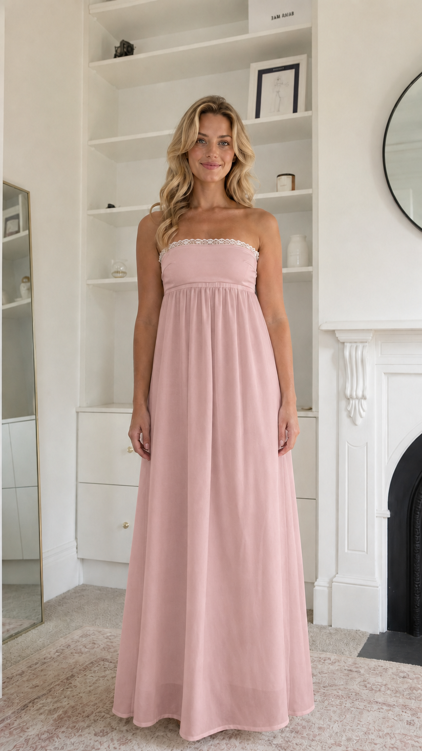 Woman wearing blush pink strapless maxi dress