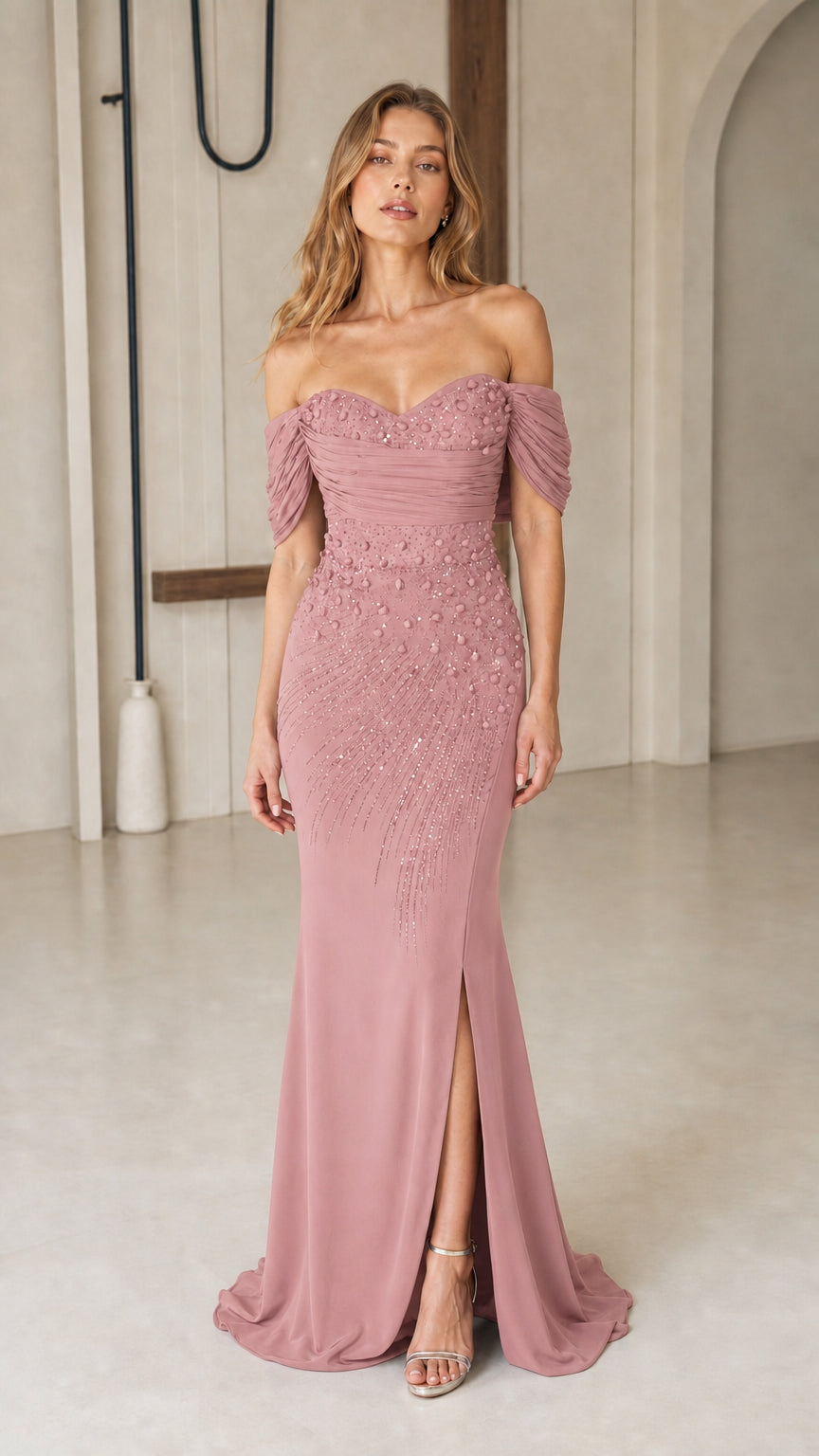 Front view of dusty rose off-the-shoulder beaded formal mermaid gown with slit