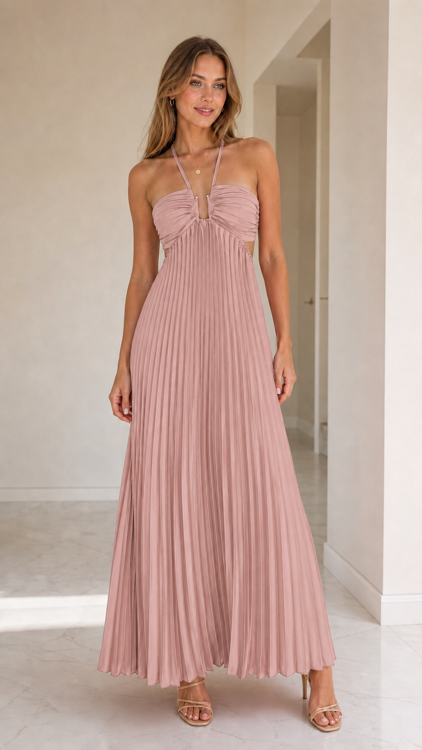 Model wearing dusty pink halter pleated maxi dress