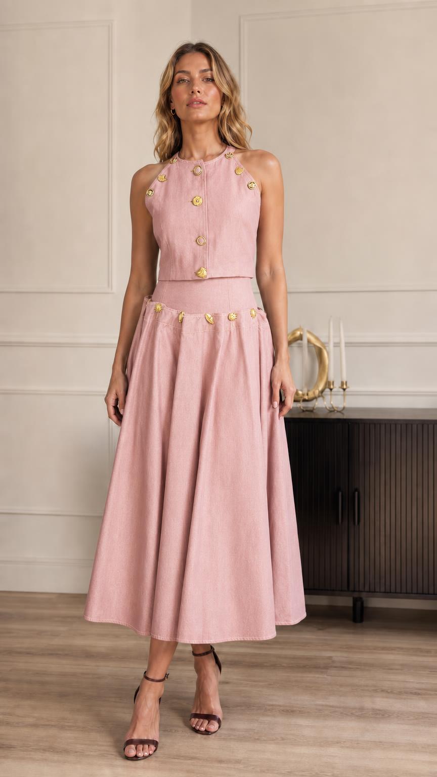 Full-length view of model in pink two-piece set
