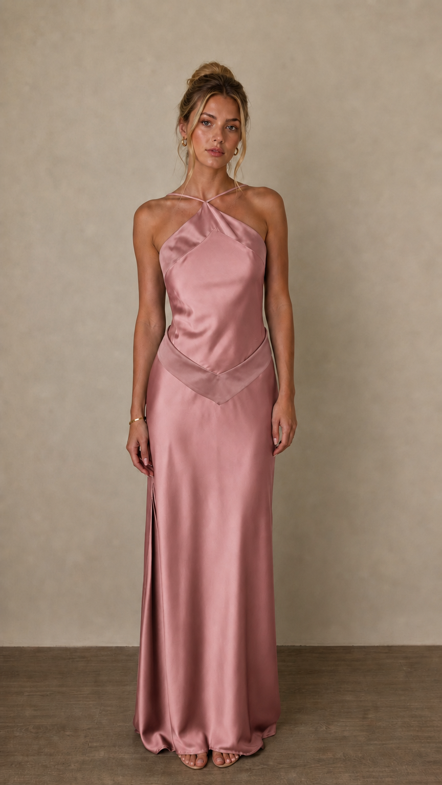 Front view of pink satin halter maxi dress on model