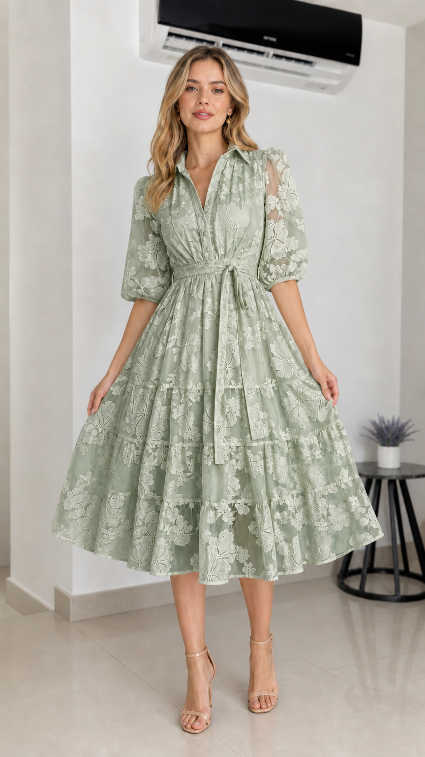 Front view of sage green floral embroidered midi dress