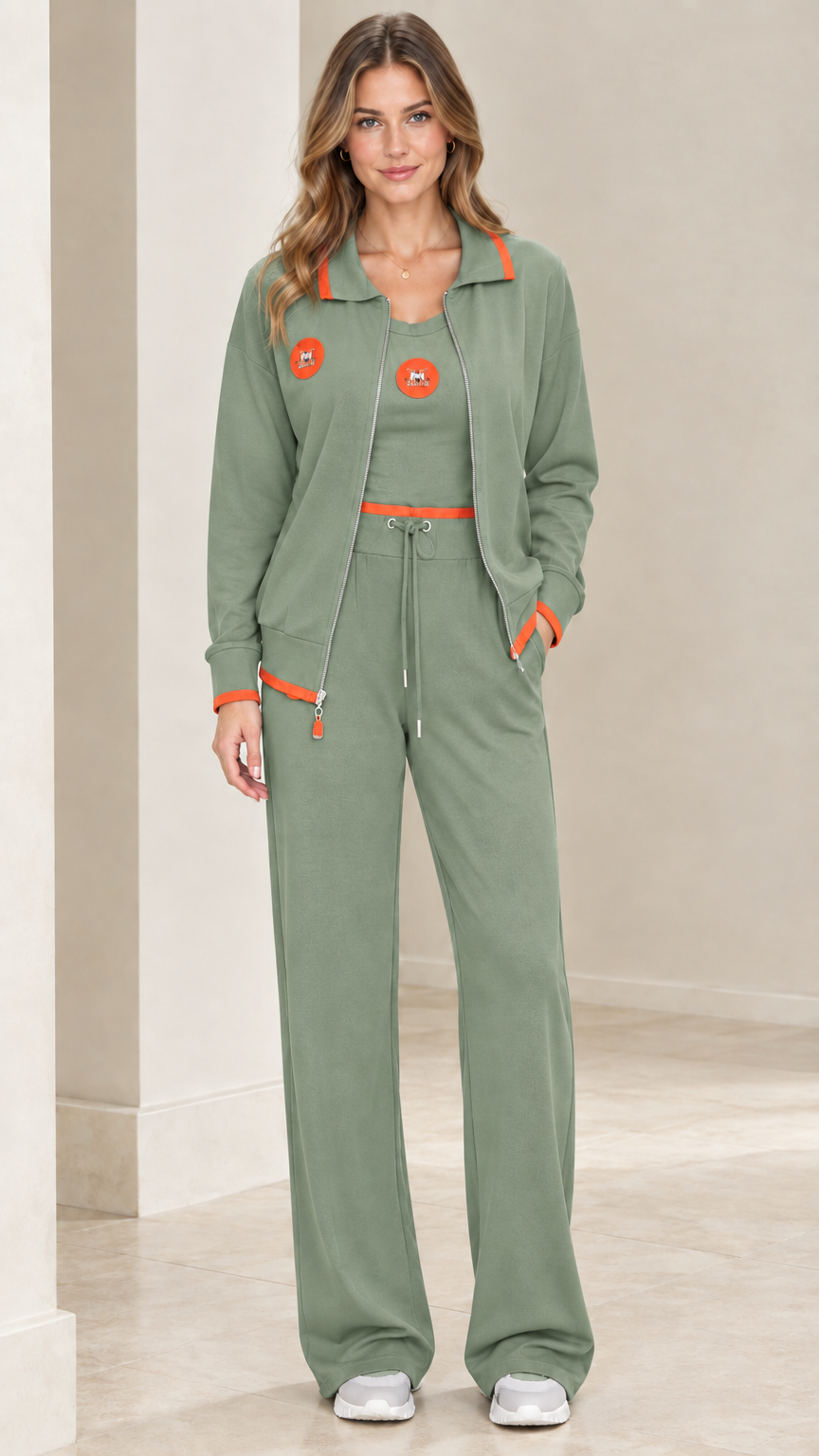 Full front view of sage green 3-piece tracksuit set with orange accents