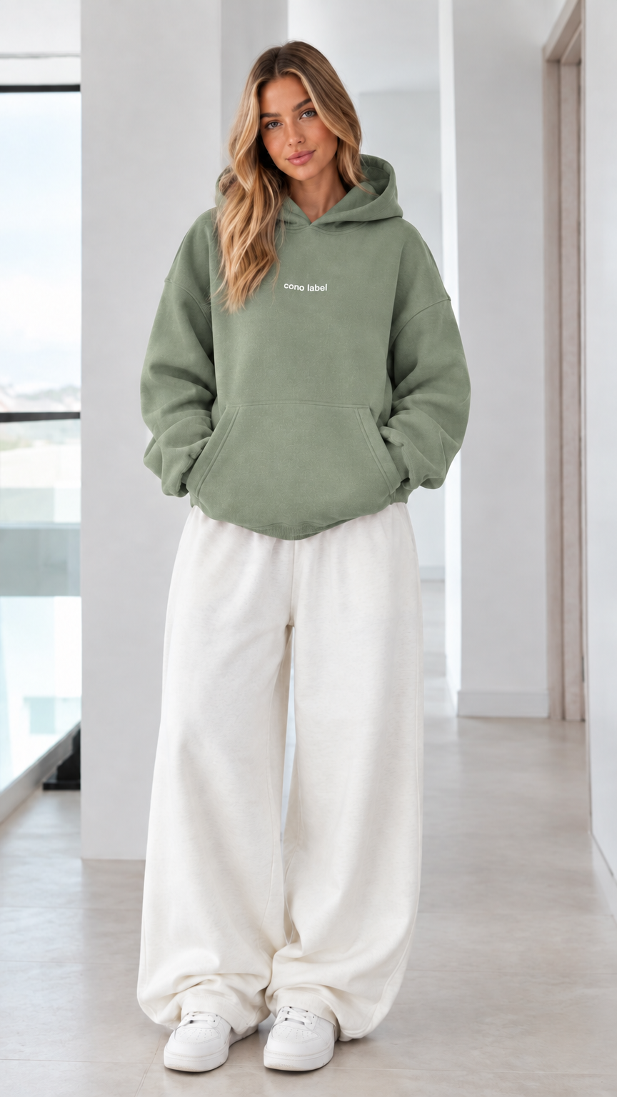 Women's sage green oversized hoodie sweatshirt on model