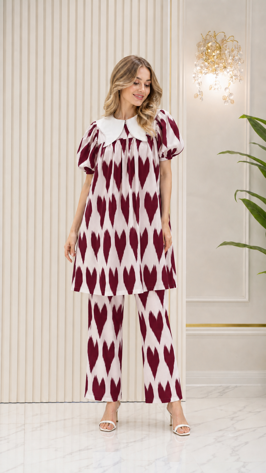 Model wearing Burgundy geometric print tunic top and trouser set