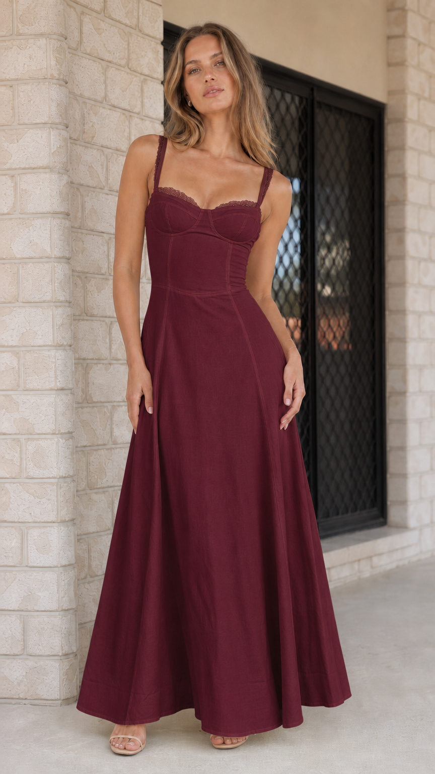 Woman wearing deep burgundy evening maxi dress