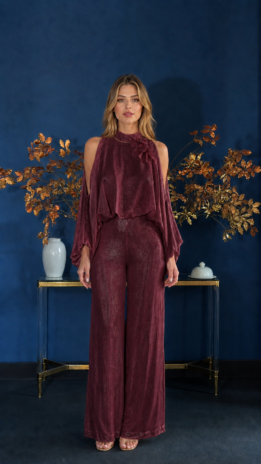 Front view of model wearing burgundy cold-shoulder jumpsuit