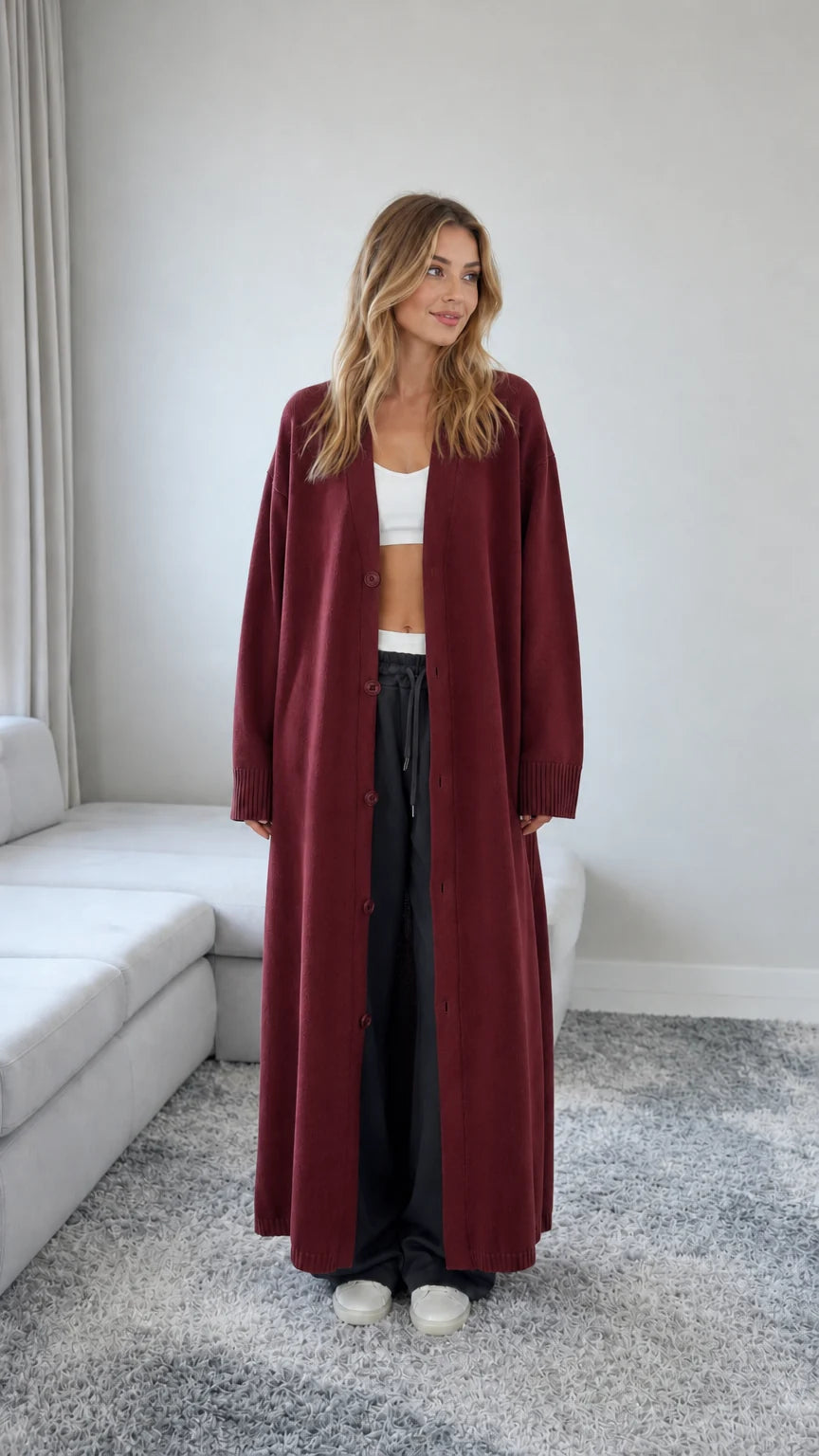 Front view of model wearing a Burgundy red floor length maxi duster cardigan