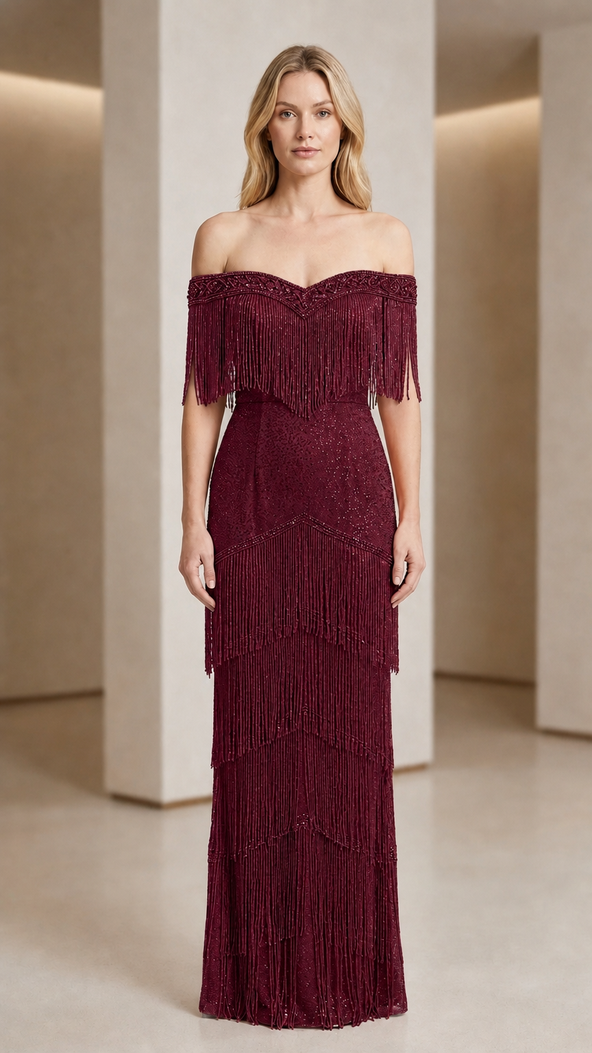 Front view of woman wearing burgundy off-shoulder beaded fringe evening gown