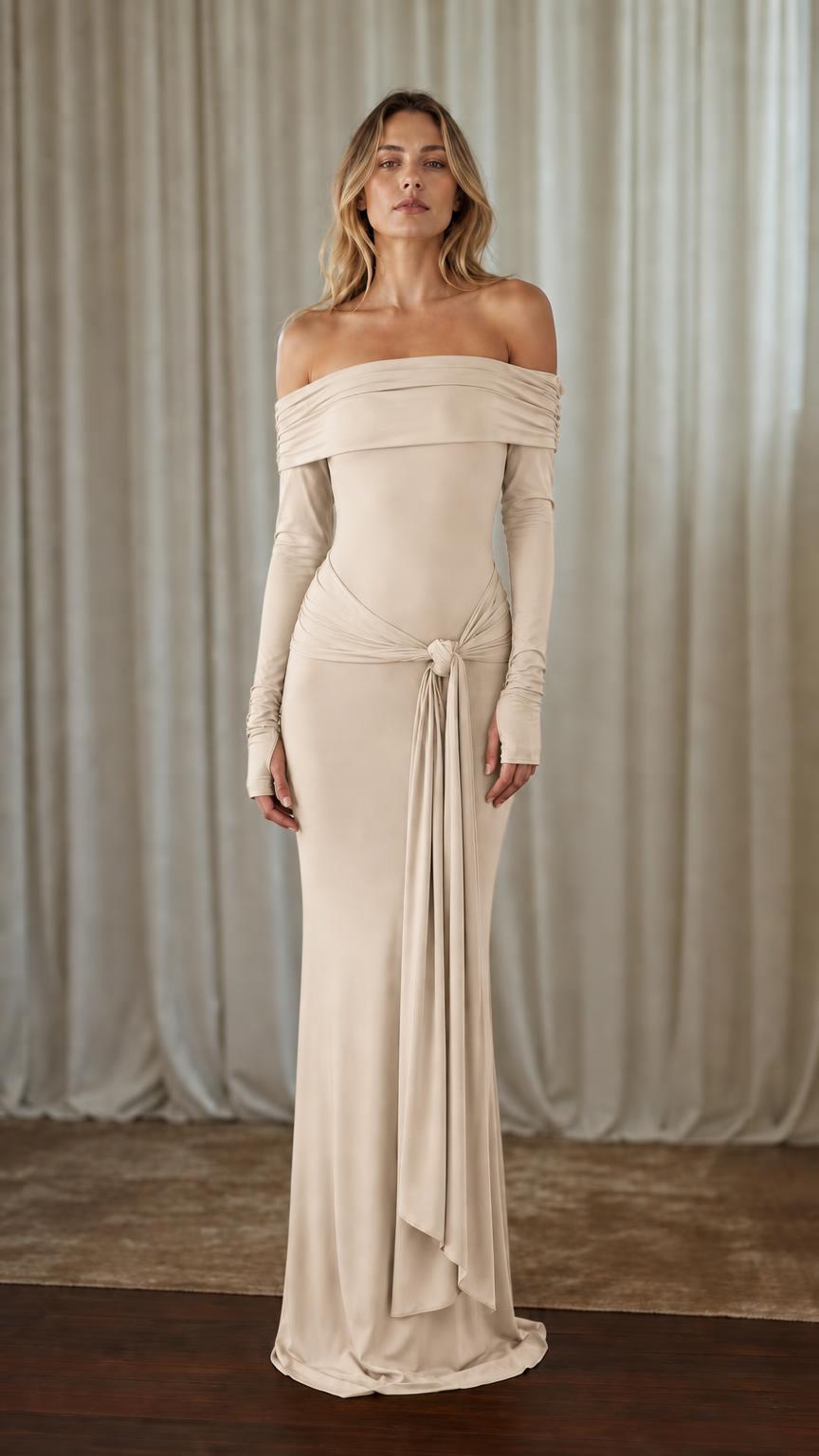 Front view of woman wearing beige off-shoulder maxi dress