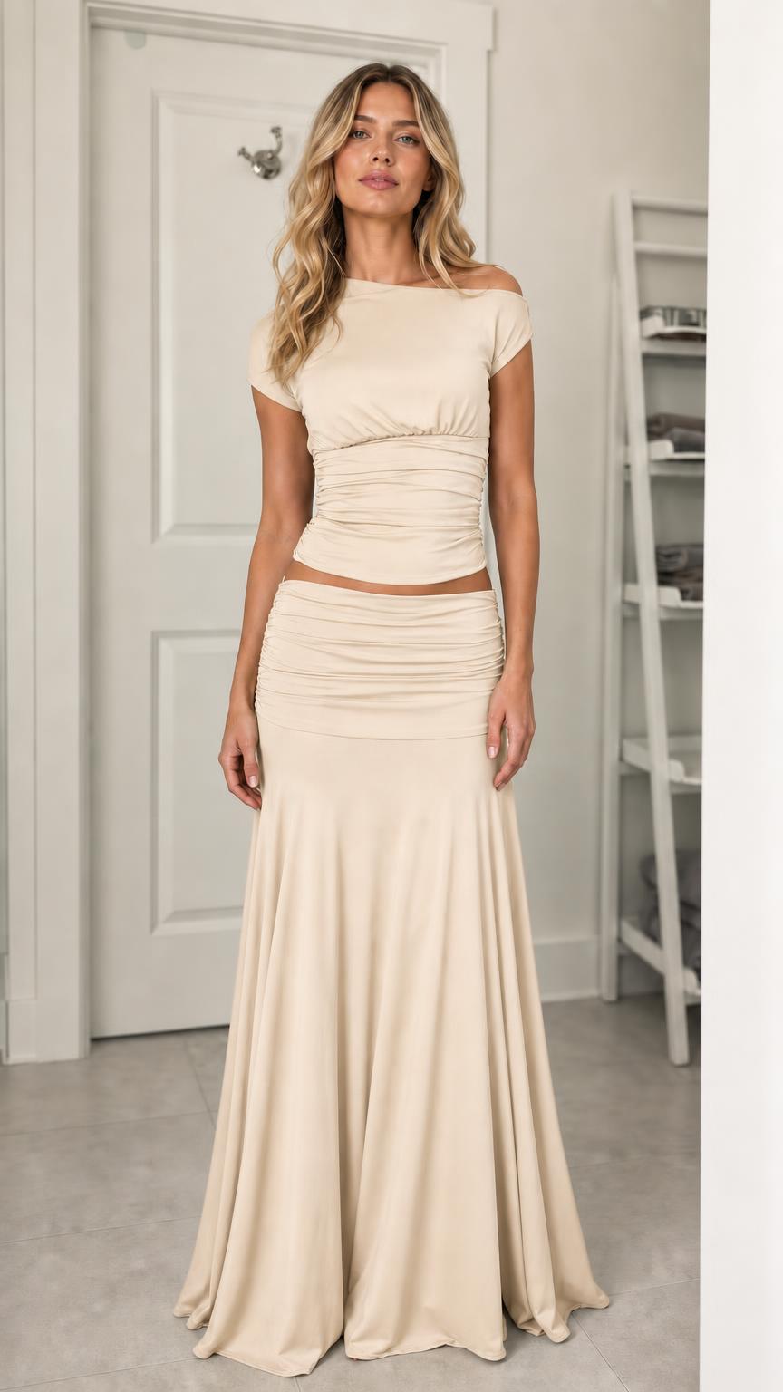 Model wearing beige ruched two-piece set