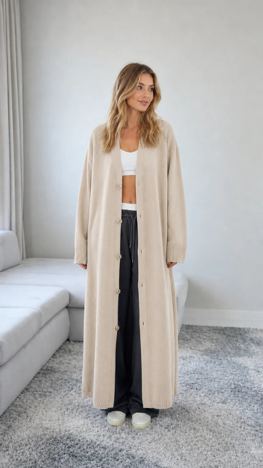 Front view of model wearing a Beige oatmeal floor length maxi duster cardigan