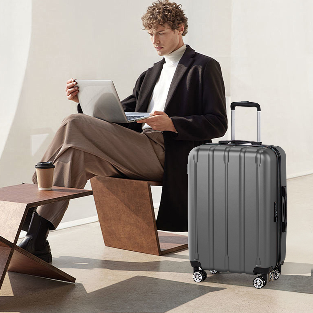 hardside rolling suitcase in travel and work scene