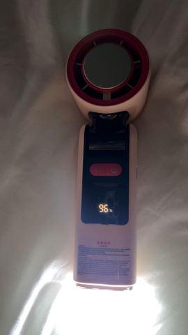 Customer photo for BOGO Handheld Cooling Fan, 5-Speed 4000mAh Rechargeable