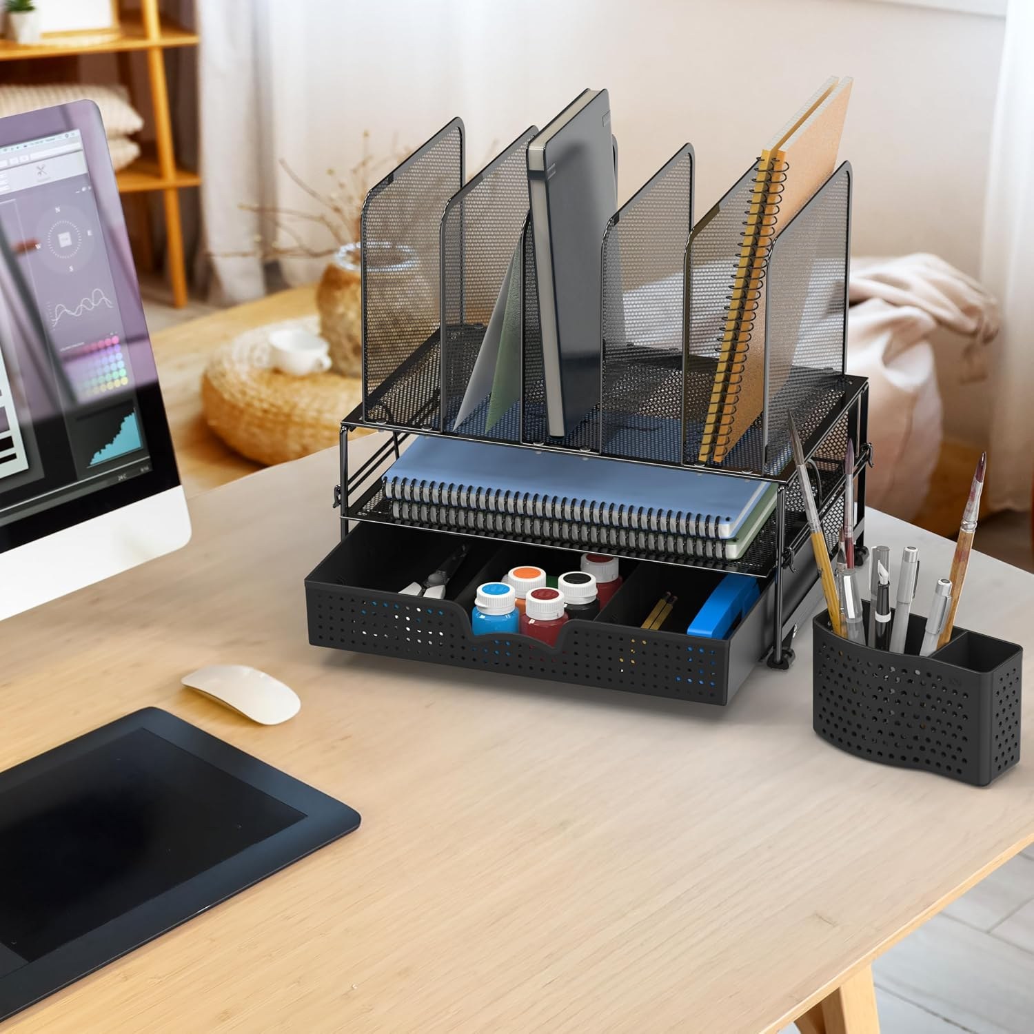 Desktop file organizer used on a work desk with office supplies