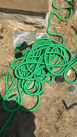 Customer photo for 100FT Heavy Duty Expandable Garden Water Hose 4-Pack