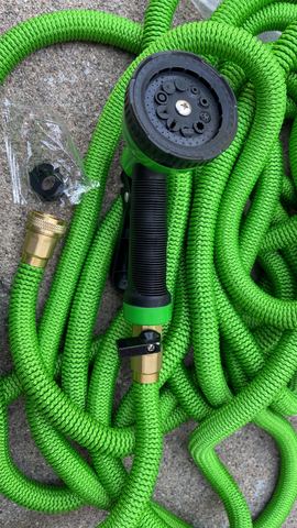 Customer photo for 100FT Heavy Duty Expandable Garden Water Hose 4-Pack