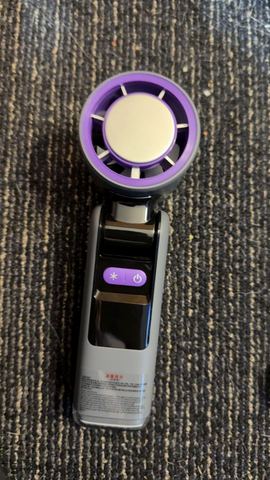 Customer photo for BOGO Handheld Cooling Fan, 5-Speed 4000mAh Rechargeable