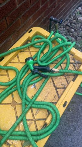 Customer photo for 100FT Heavy Duty Expandable Garden Water Hose 4-Pack