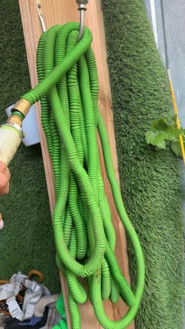 Customer photo for 100FT Heavy Duty Expandable Garden Water Hose 4-Pack
