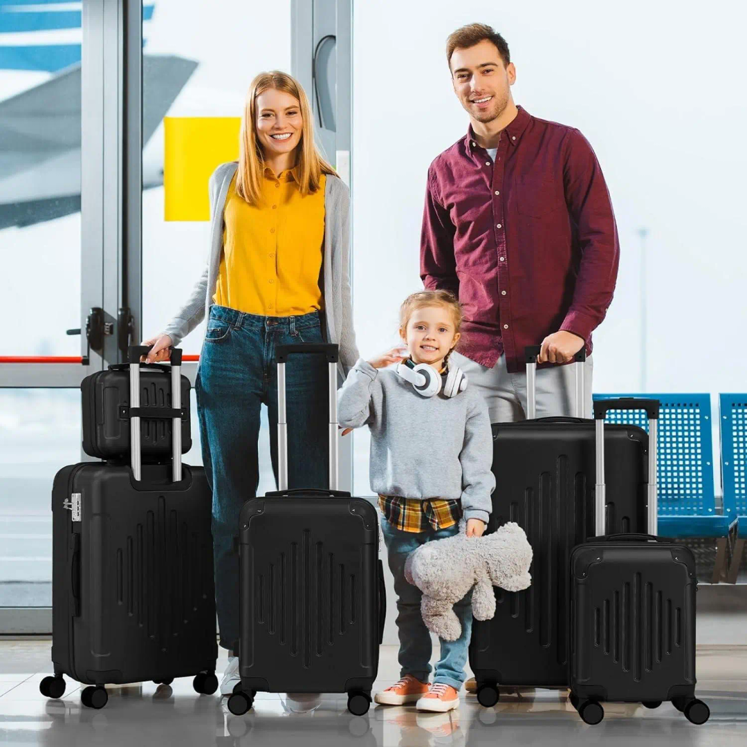 family travel scene with matching black luggage set