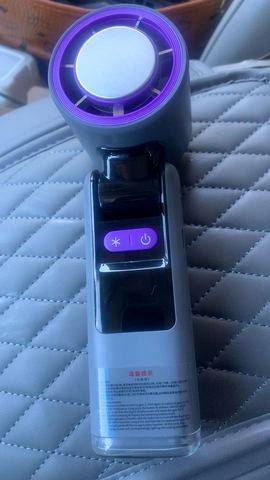 Customer photo for BOGO Handheld Cooling Fan, 5-Speed 4000mAh Rechargeable