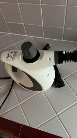 Customer photo for Handheld Steam Cleaner with 12 Accessories