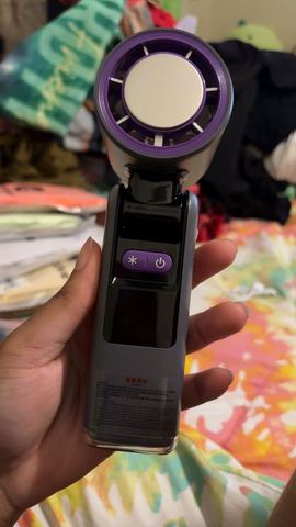 Customer photo for BOGO Handheld Cooling Fan, 5-Speed 4000mAh Rechargeable