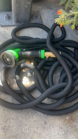 Customer photo for 100FT Heavy Duty Expandable Garden Water Hose 4-Pack