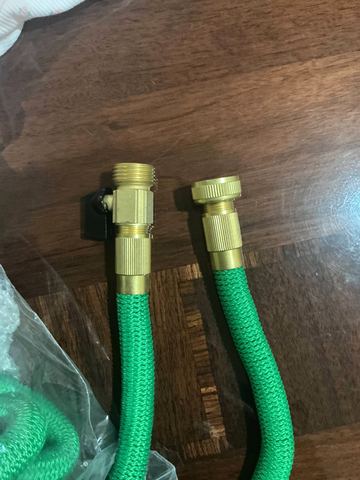 Customer photo for 100FT Heavy Duty Expandable Garden Water Hose 4-Pack
