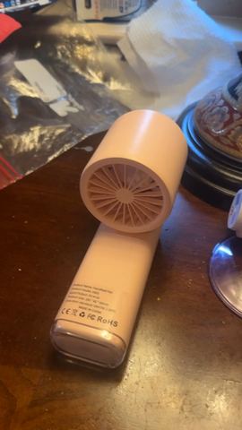Customer photo for BOGO Handheld Cooling Fan, 5-Speed 4000mAh Rechargeable