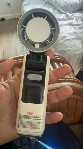 Customer photo for BOGO Handheld Cooling Fan, 5-Speed 4000mAh Rechargeable